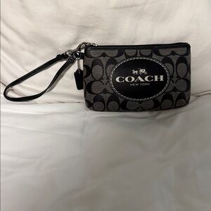 Coach Horse and Carriage signature Monogram Black and white Wristlet Like New!